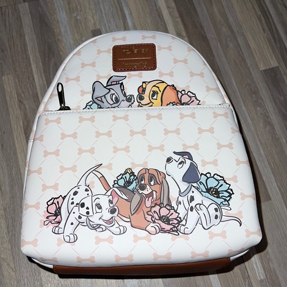 Loungefly Handbags - LOUNGEFLY DISNEY puppy playtime mini backpack